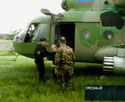 Владимир Путин прилетел в Чечню на два часа и на простом вертолете (фото с телеэкрана)