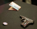 Личное оружие Гитлера, его партийный билет и партийный значок, добытые советскими чекистами в мае 1945-го