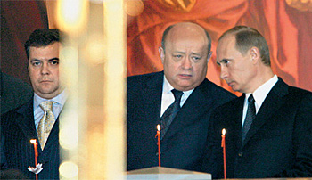 У Путина и Медведева (на фото с Михаилом Фрадковым) общий духовный дедушка, хотя и разные духовные отцы