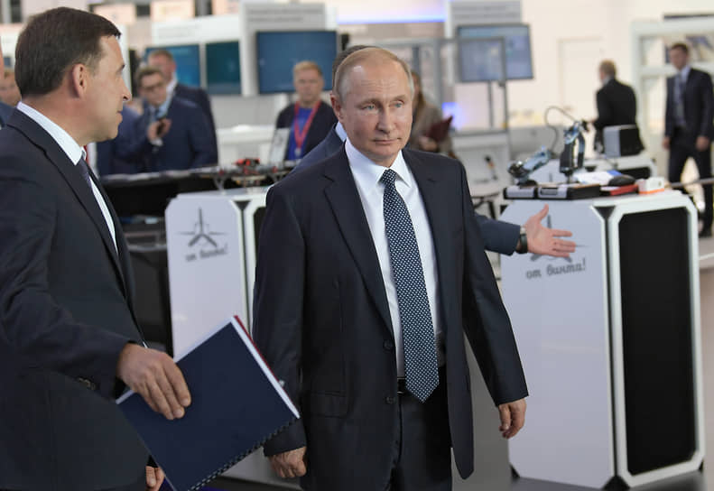 Губернатор Свердловской области Евгений Куйвашев (слева) и президент России Владимир Путин (справа) 
