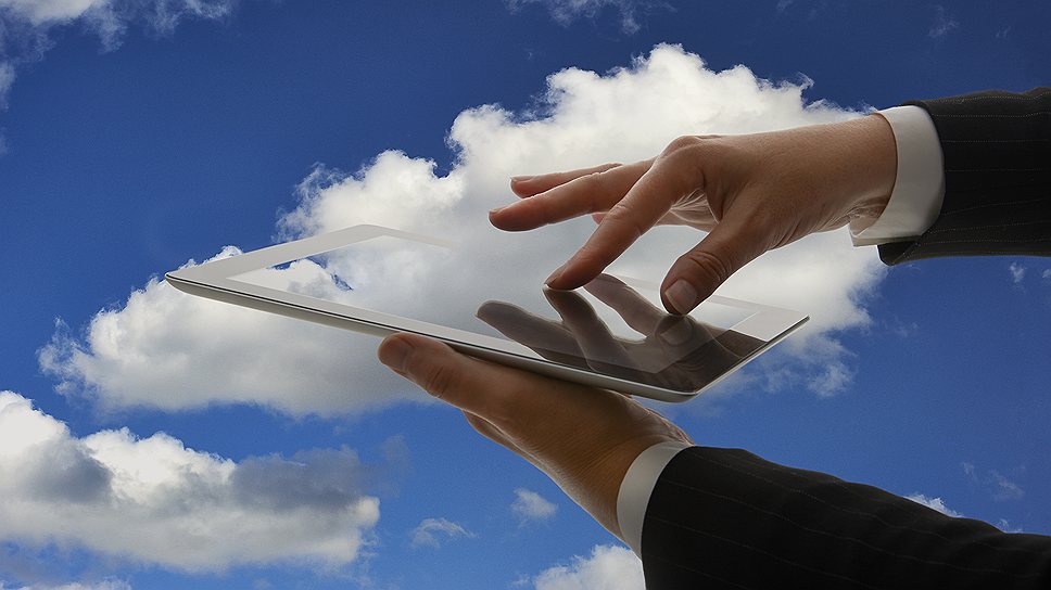 Tablet computer in cloud concept .