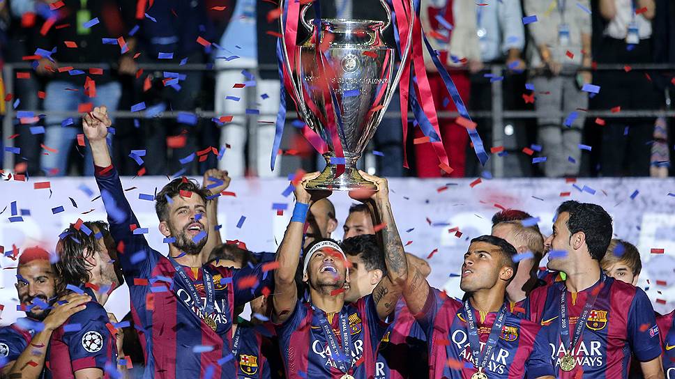 Футболисты испанской &quot;Барселоны&quot; после победы над туринским &quot;Ювентусом&quot; в финале Лиги чемпионов, Берлин, 7 июня 2015 года 
