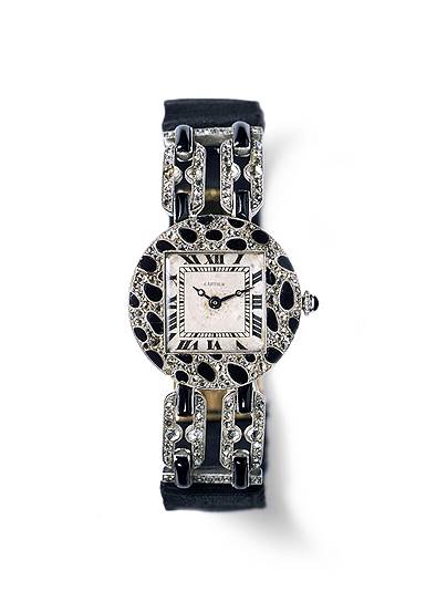 Часы, 1914 год (первое появление мотива пятнистой пантеры в коллекциях дома Cartier) 
