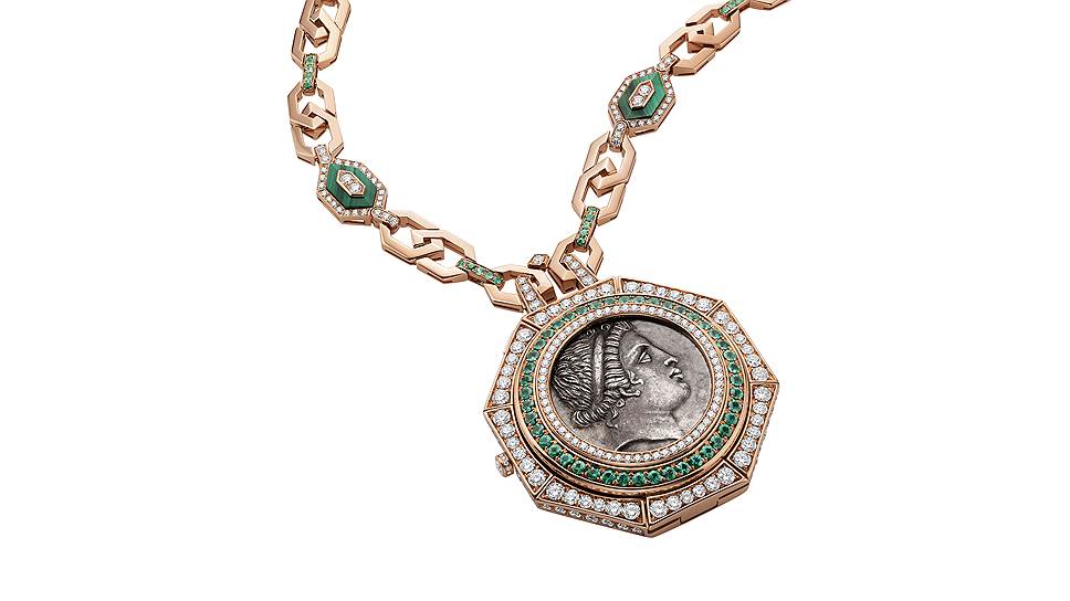 Часы-кулон Monete, розовое золото, античная серебряная монета, циферблат из малахита 
