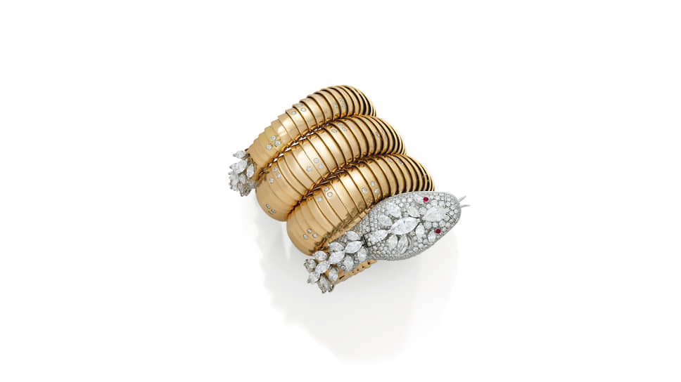 Лот 337 аукциона Magnificent Jewels (Женева). Часы-браслет Serpenti с бриллиантами и рубинами, Bvlgari, 1960-е годы. Эстимейт 200–300 тыс. швейцарских франков
