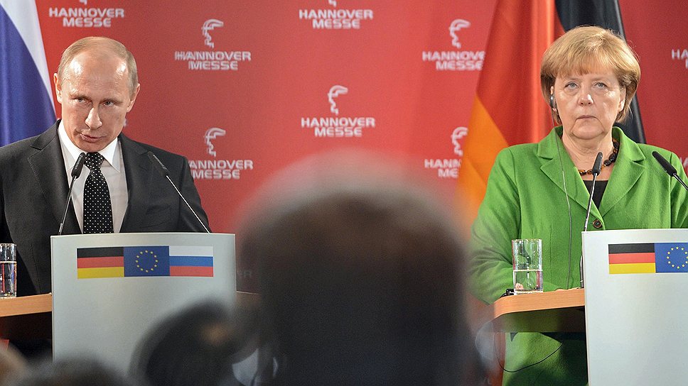Главам ведущих европейских стран (справа — канцлер Германии Ангела Меркель) становится все труднее объяснять своим избирателям причины дружеских отношений с Россией
