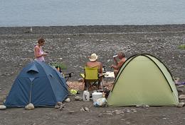 Tourists on wild beaches on the Black Sea coast.