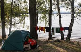 Big Simaginskoe lake. Vacationers in the Veresk Eco-park.