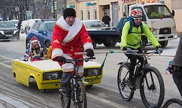 Traditional winter bicycle parade of Fathers Frost and Snow Maidens in St. Petersburg.