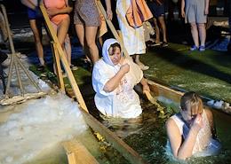 Feast of the Baptism of the Lord. Epiphany bathing at the Klyazma reservoir near the Trinity Church in the village of Troitskoye.