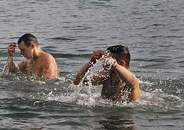 Feast of the Baptism of the Lord. Epiphany bathing in the Black Sea on the beach of Alushta.
