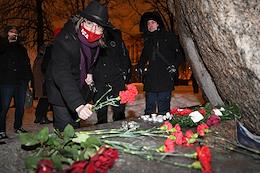 Memorial Day of Novaya Gazeta journalist Anastasia Baburova and human rights lawyer Stanislav Markelov. Laying flowers at the Solovetsky stone.