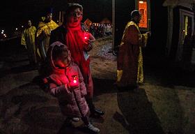 Festive Easter service in the Church of Saints Peter and Paul in the village of Novaya Izhora.
