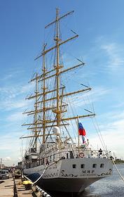 Sailing training ship frigate 'Mir' at the berth of the Big Port of St. Petersburg.