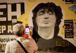 Gathering of fans of Viktor Tsoi's music on the day of his death at the wall of Tsoi on Stary Arbat Street.