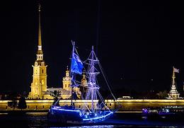 Parade of historical ships in the waters of the Neva.